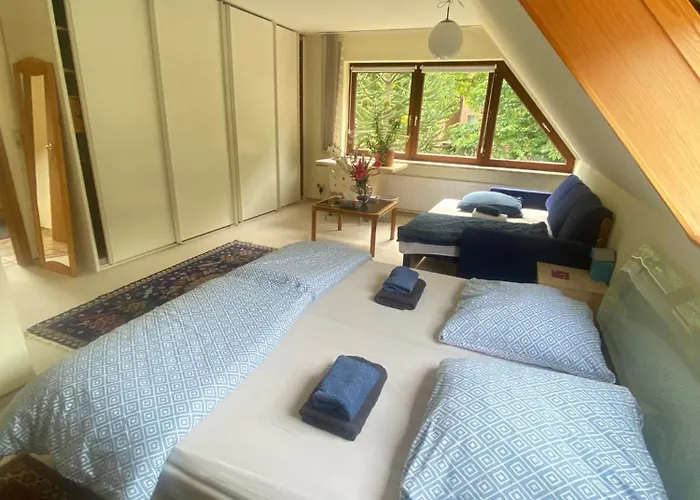 Gartenblick-oase: Obergeschosswohnung In *